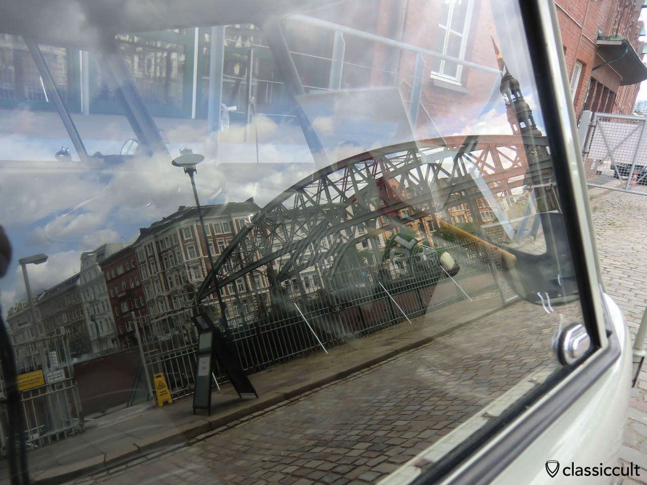 Hamburg Speicherstadt reflection on German Customs VW T1 window