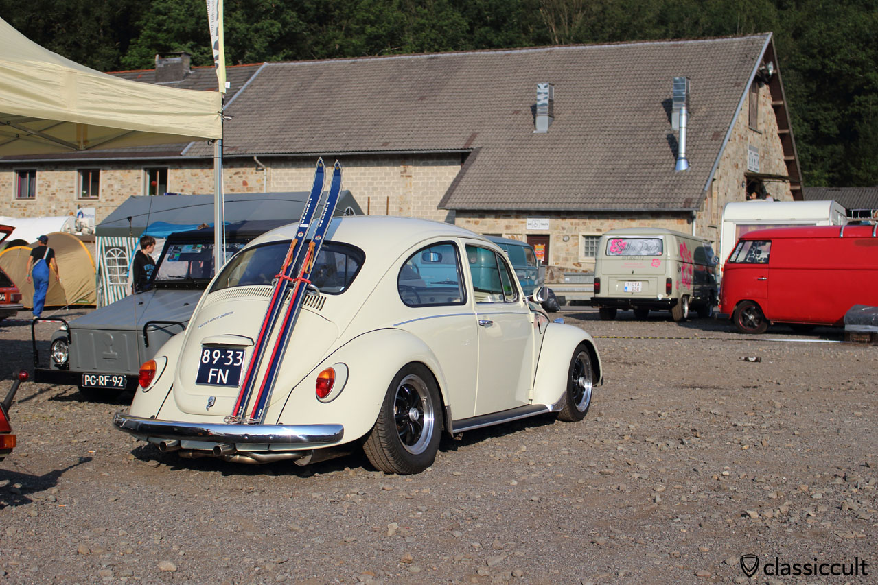 white VW Beetle with ski rack