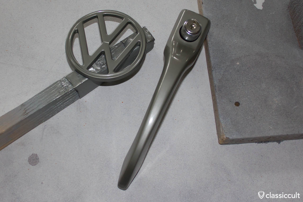 VW 1200A Beetle Hood Emblem painted with Standox L328 and a nos vw steel grey door handle