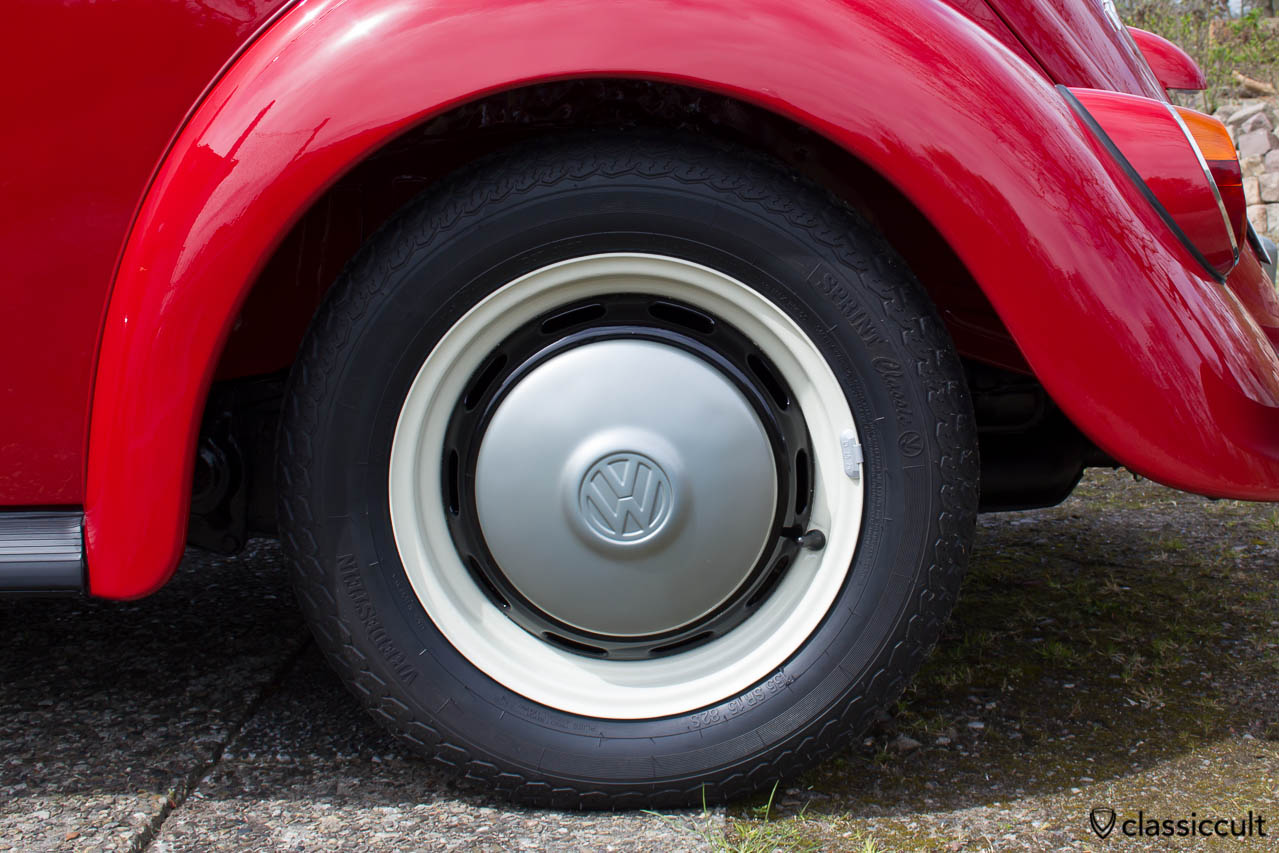 VW 1200A hubcaps are steel grey L328. The wheels are pearl white L87 and black L41.