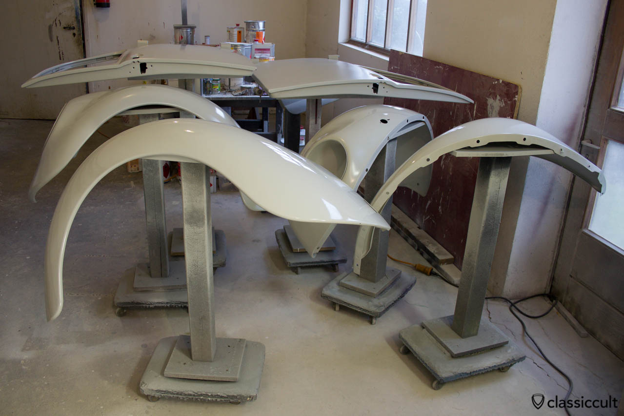 VW Beetle fenders and doors painted with filler. Ready for wet sanding.