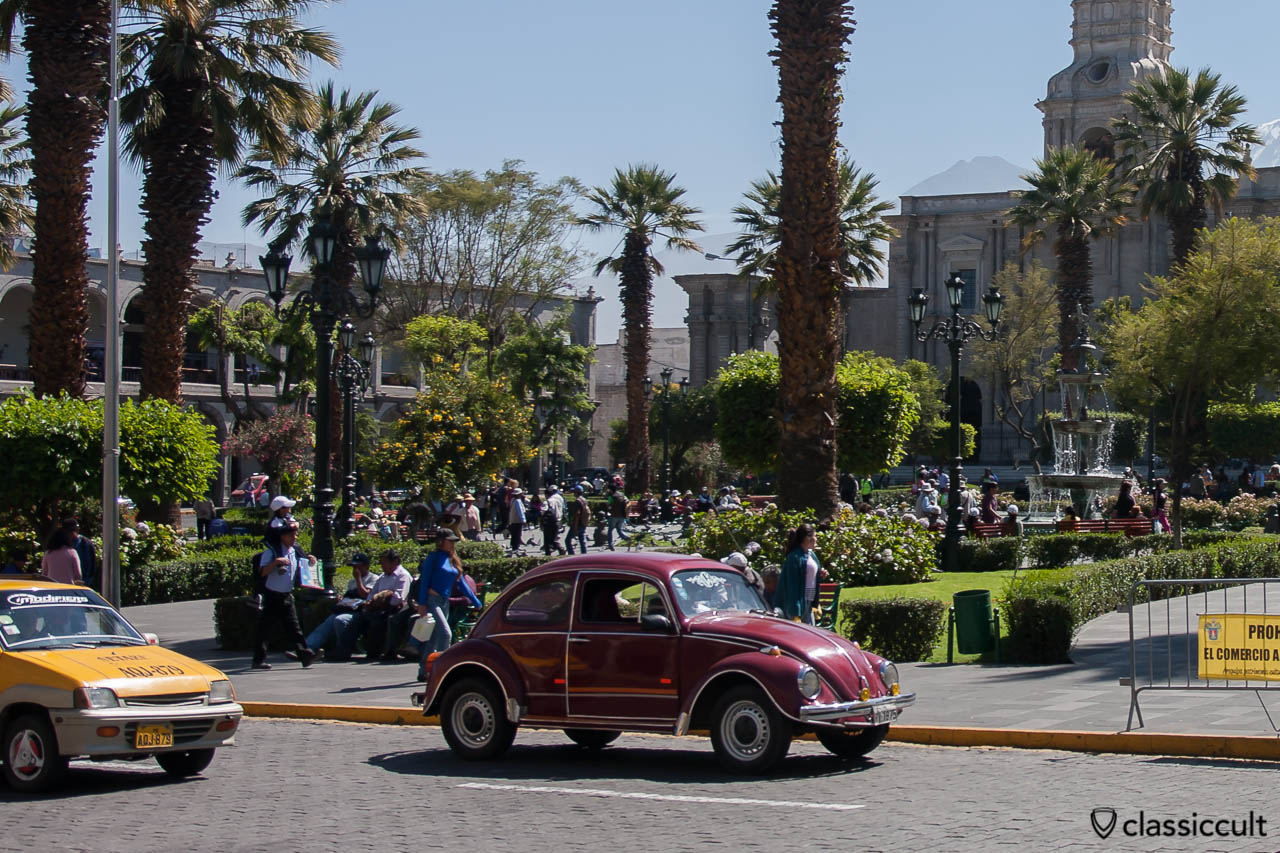 VW Beetle and the Plaza de Armas of Arequipa, Peru, May 8, 2013