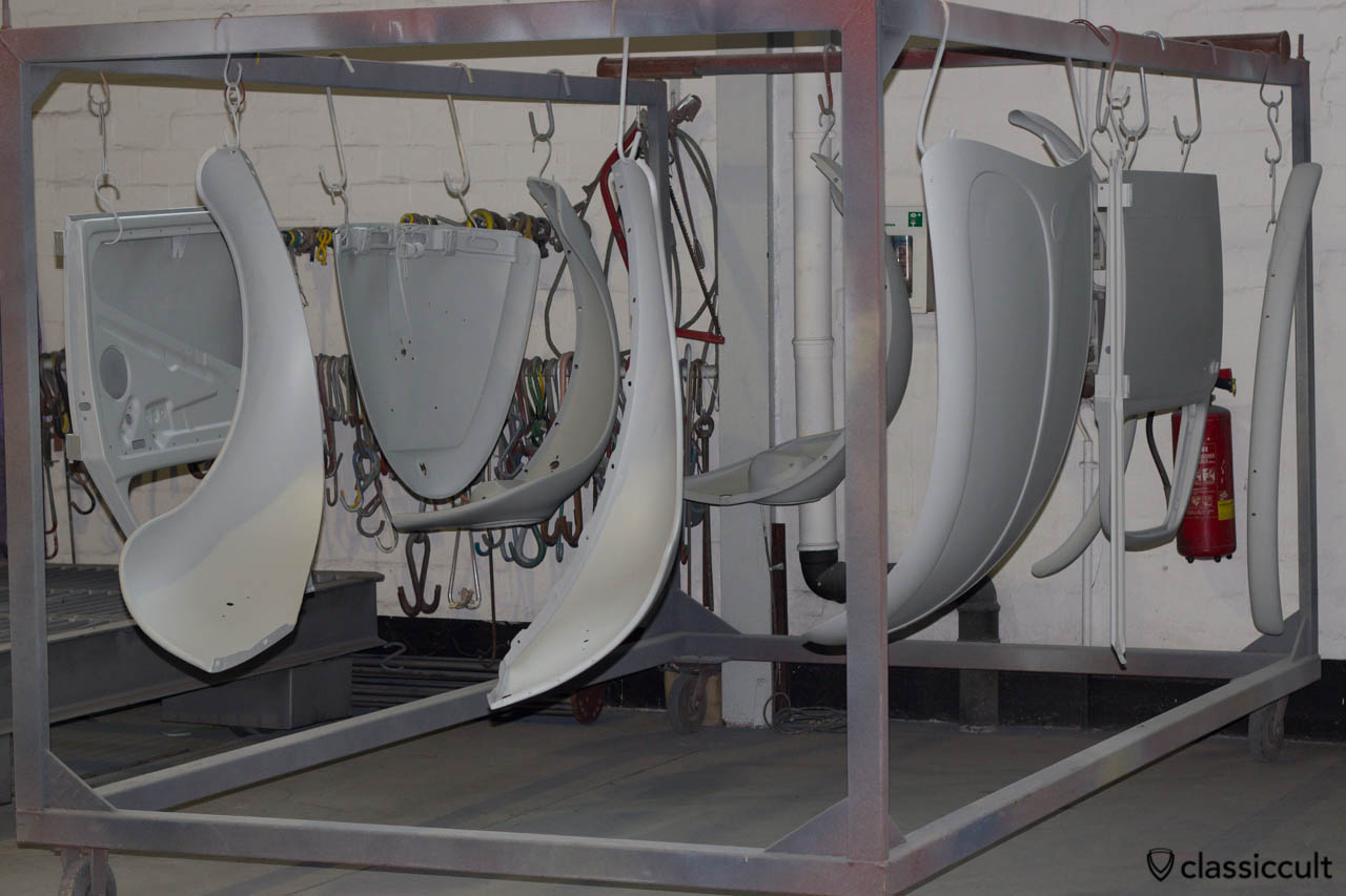 VW Beetle restoration fenders, doors and hood sandblasted and painted with epoxy primer.