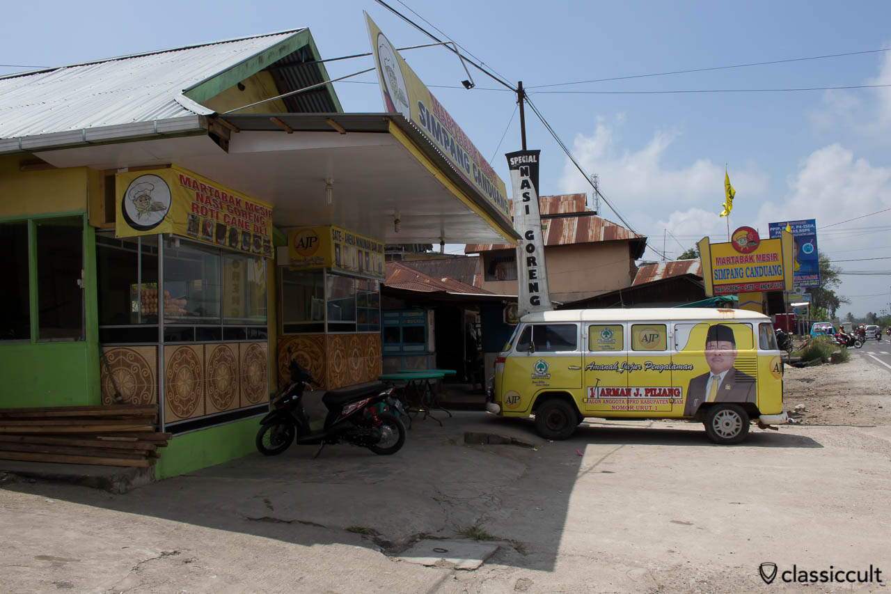 VW Bay Bus with advertisement of the Indonesian Party Golongan Karya in Payakumbuh Sumatra Indonesia.